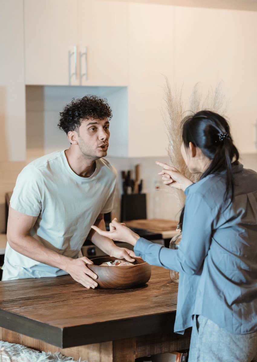 couple arguing in their kitchen