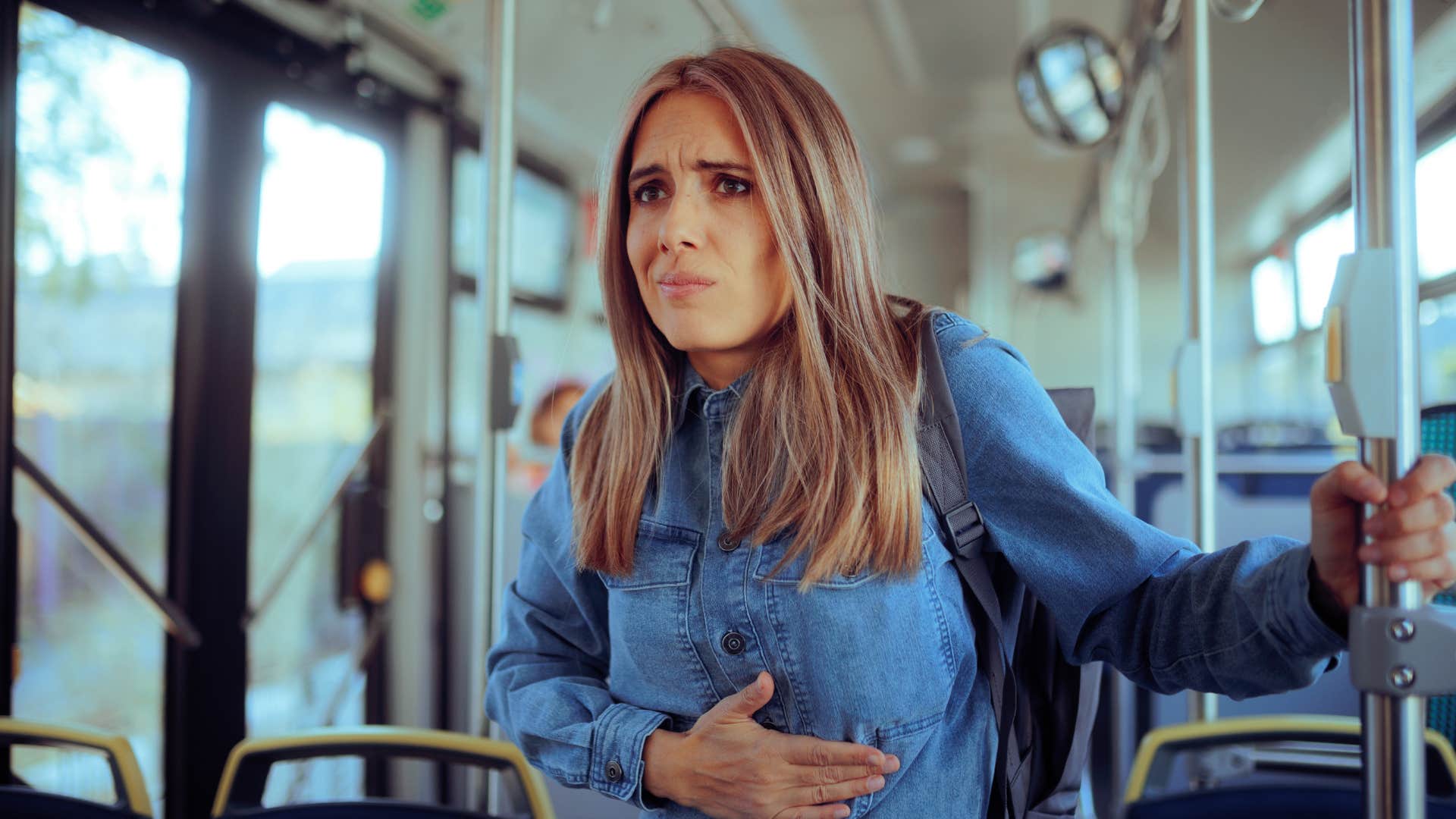 woman who feels nausea as a migraine symptom