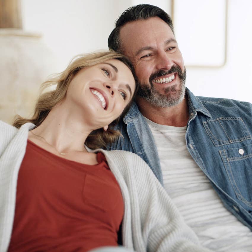 happy husband supporting and celebrating his wife's goals