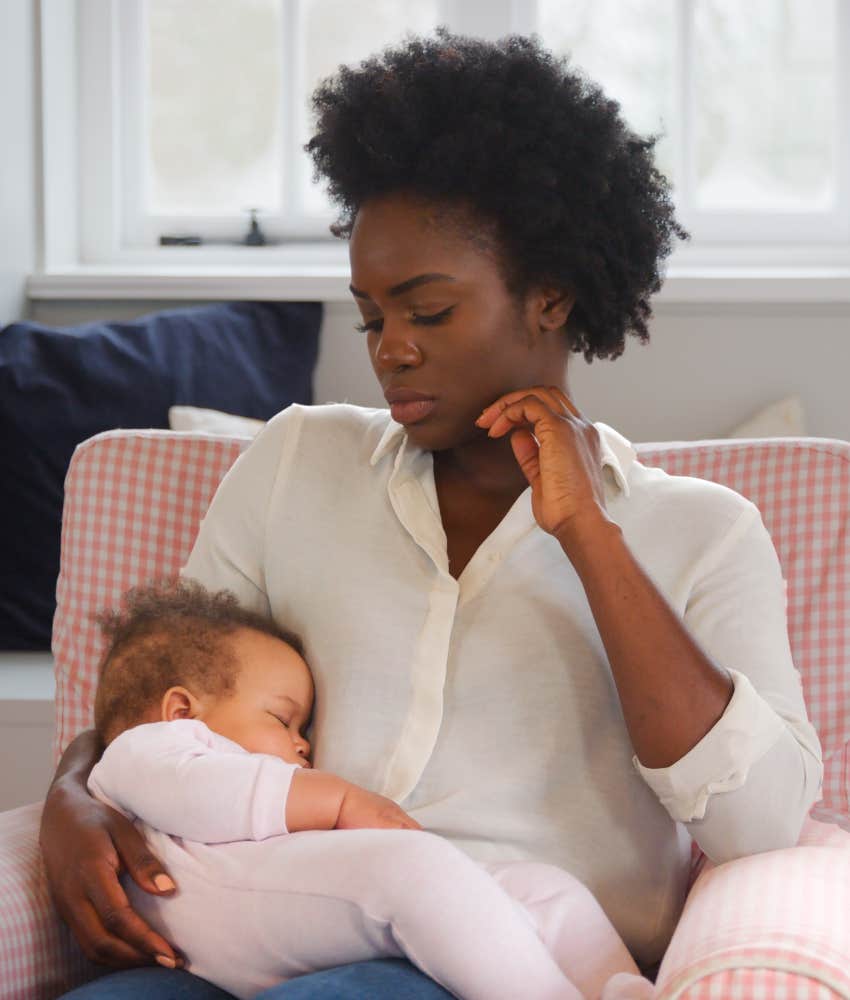 mom holding baby that looks like ex-partner