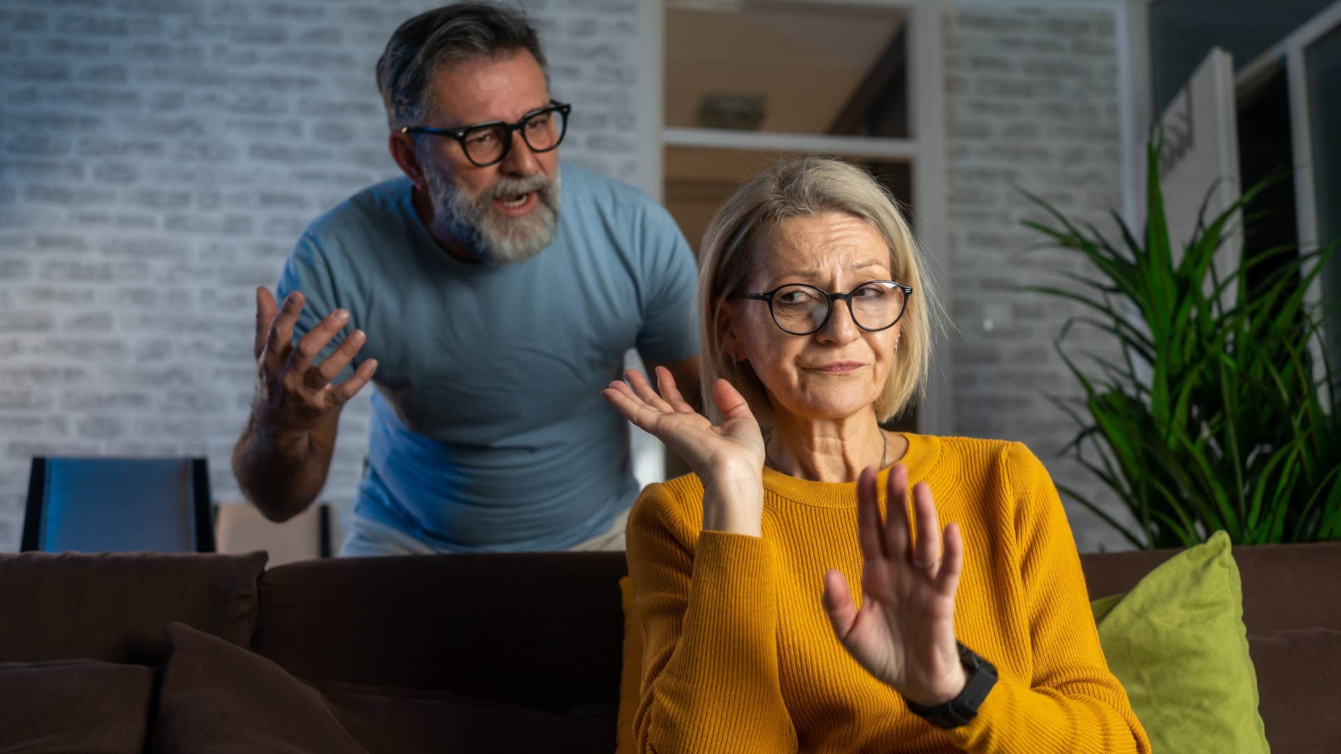 Man who hyperfocuses on self-help arguing with his wife.
