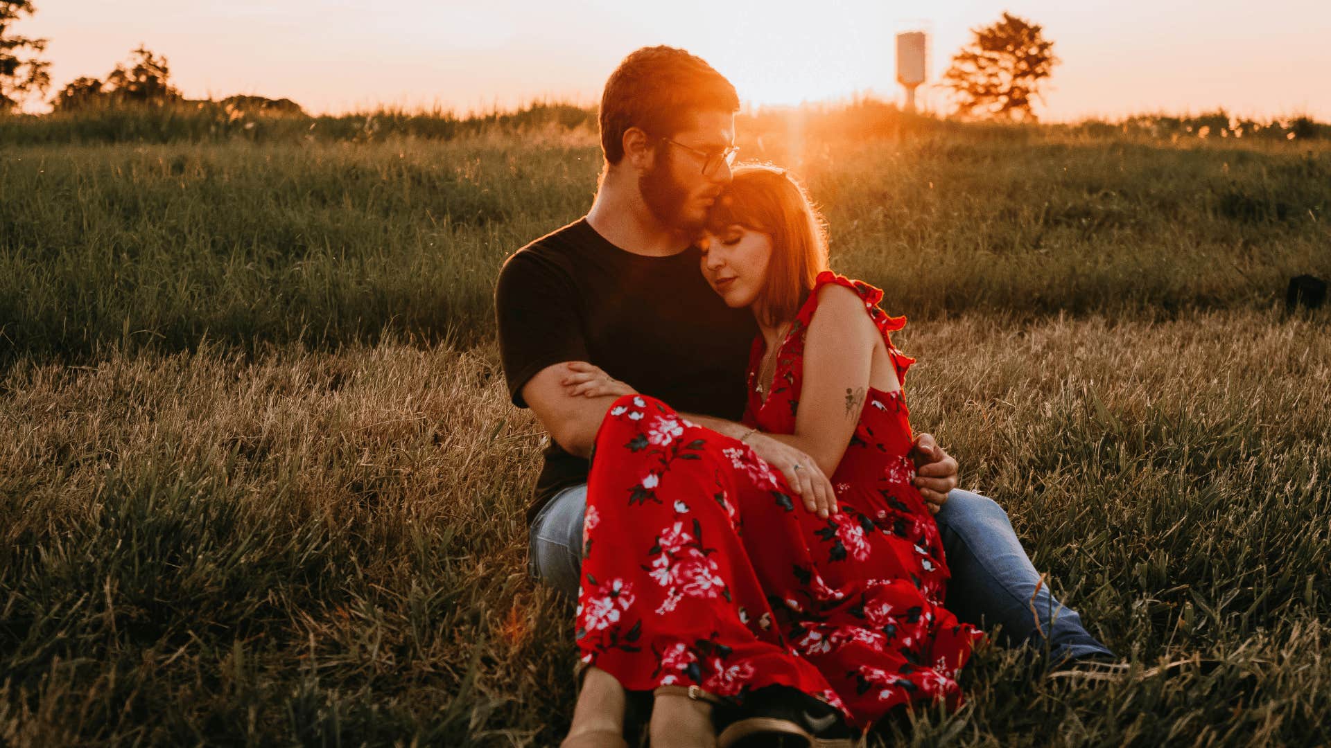 couple cuddling outside chooses love over fear
