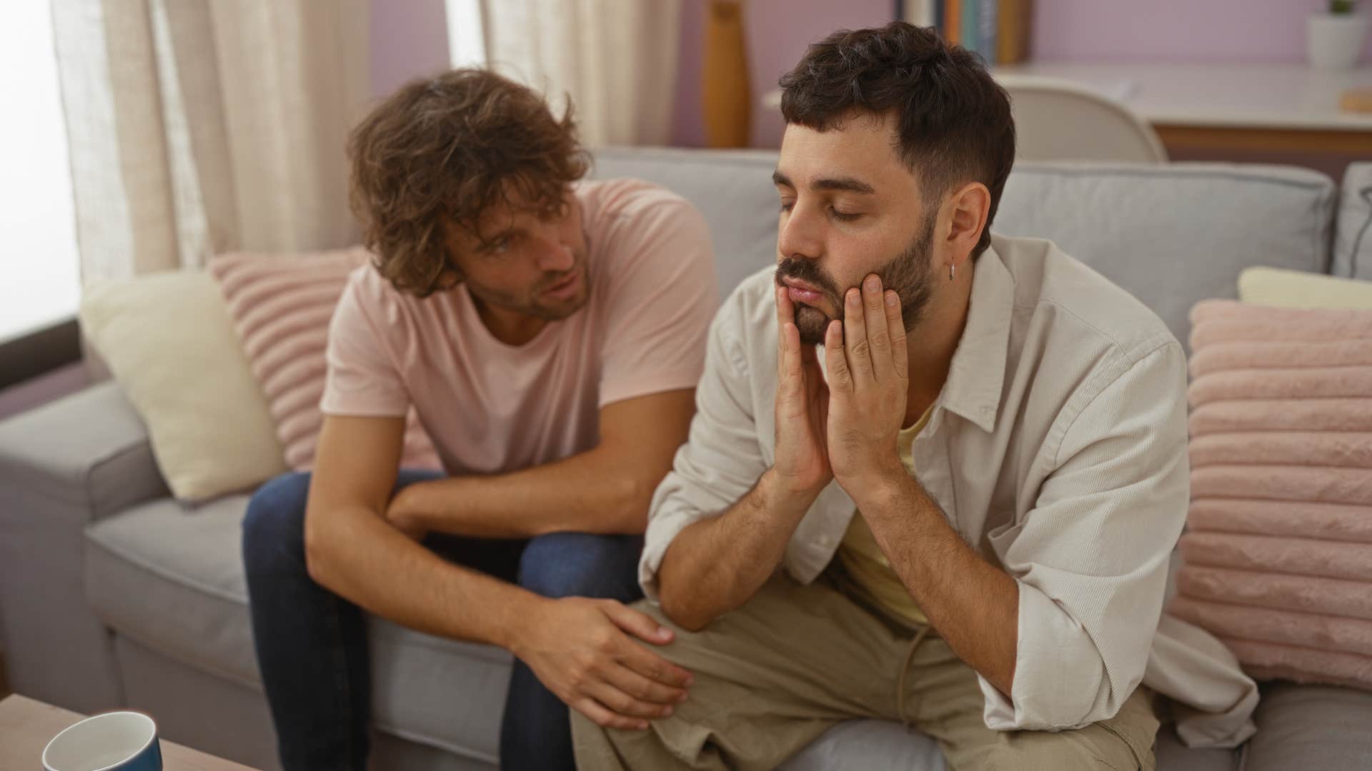 man listening to friend talk about problems