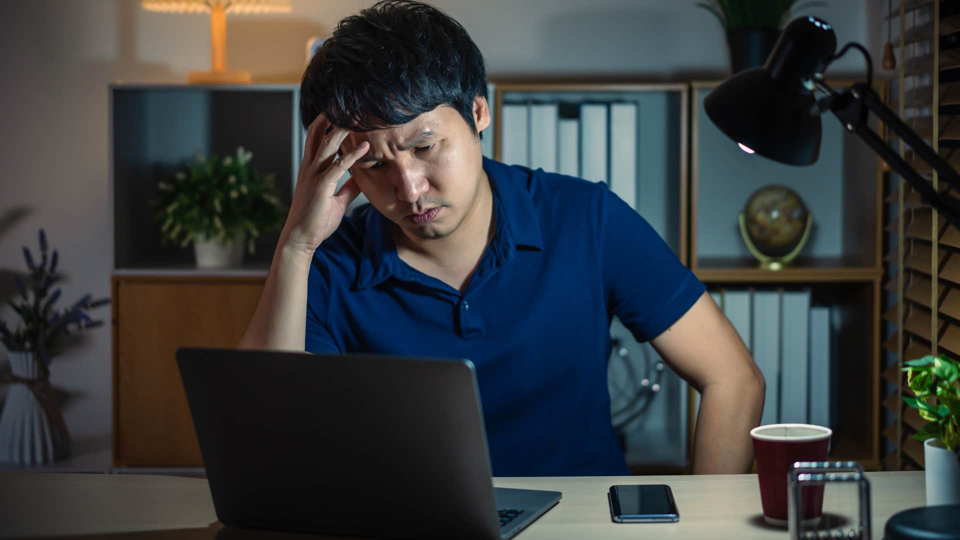 man working late avoiding rest