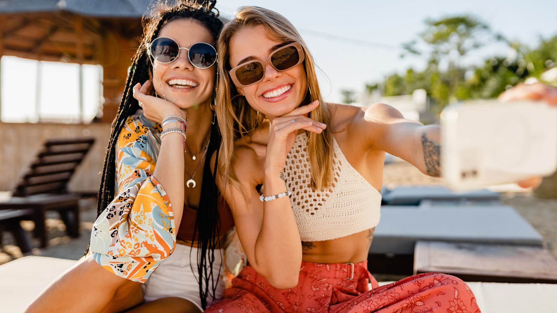 two women taking picture for social media