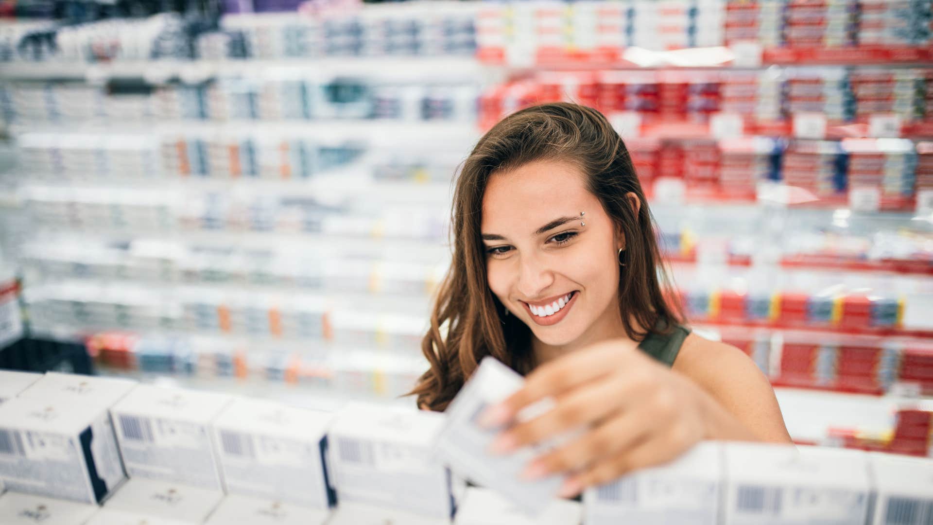woman who is thinking something through before she buys it