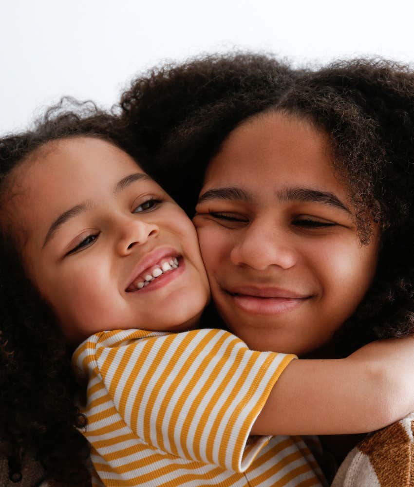 Kind siblings hug shoiwng how to set boundaries