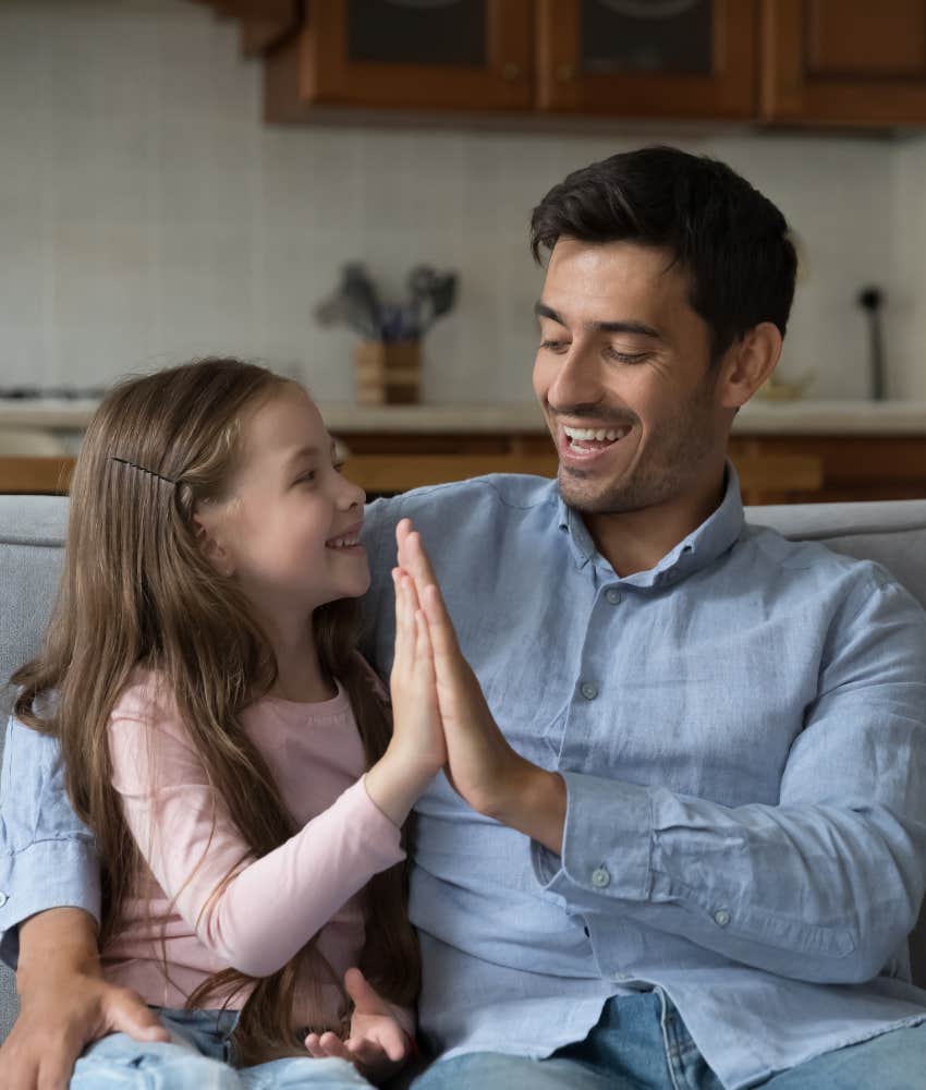 happy parent an d child high five showing how to set boundary