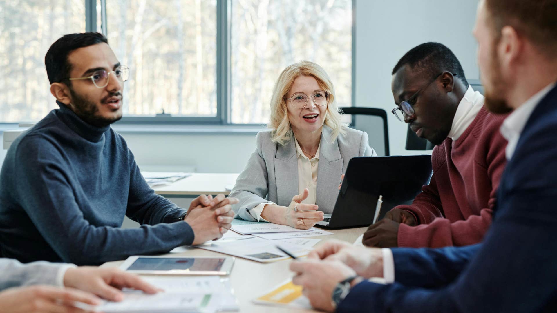 colleagues having work meeting analytical person saying i want to make sure i'm understanding correctly