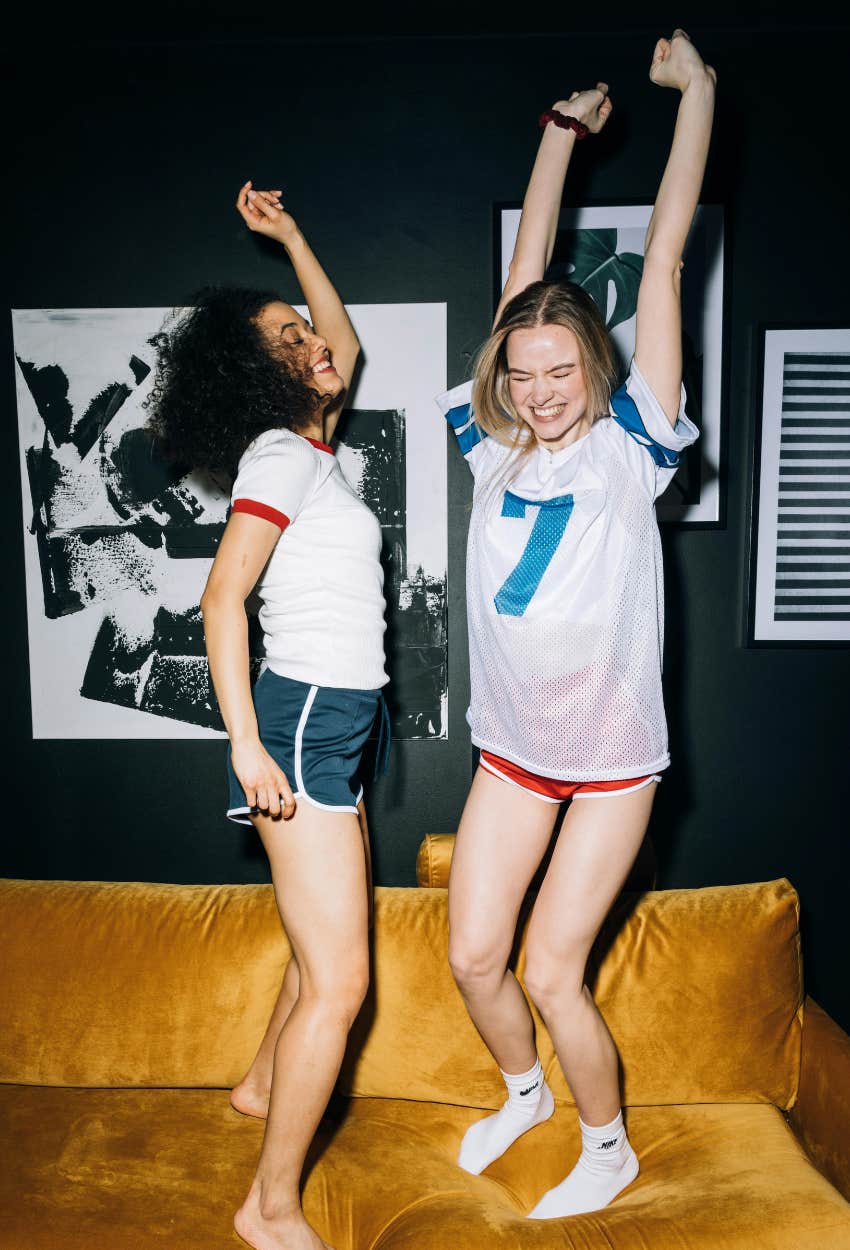 friends who are dancing and having fun because their share similar brain activity