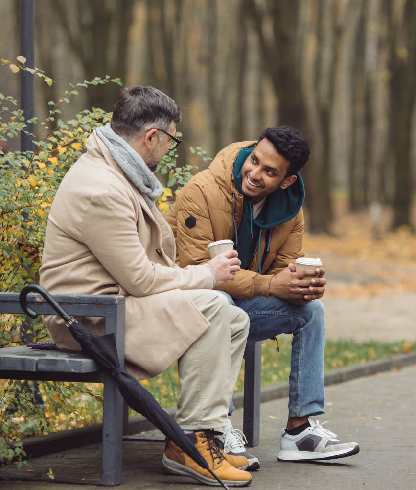 Intergenerational friends sharing coffee and different perspectives on history and the future