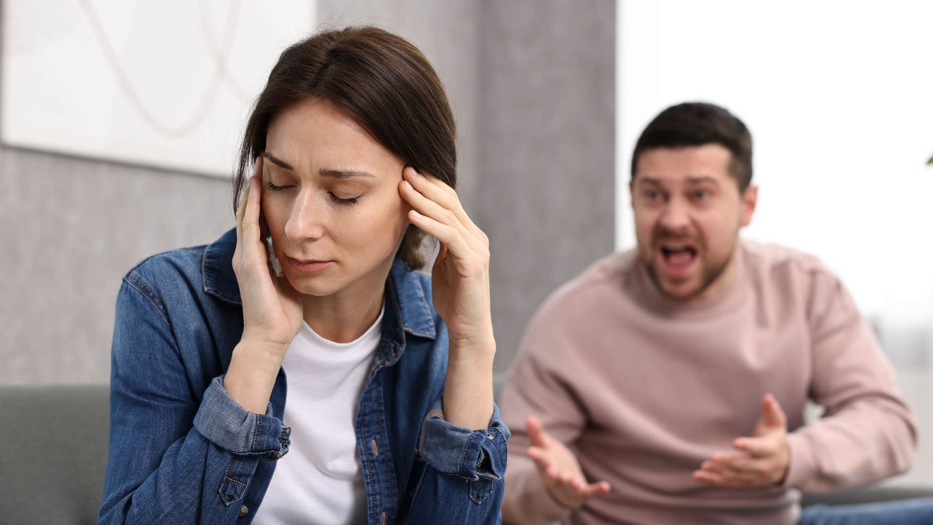 Angry person yells at relationship partner showing burnout