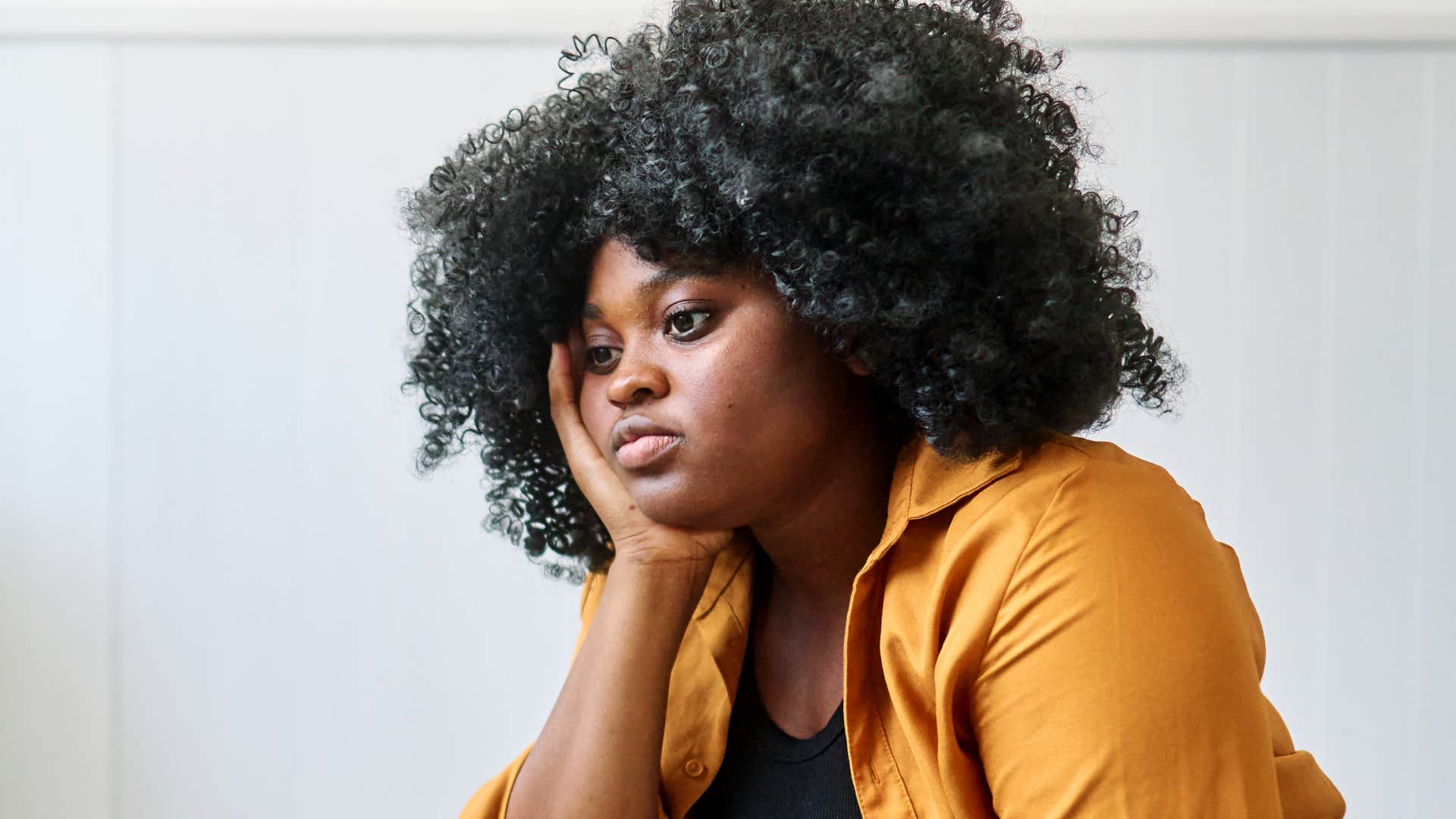 woman who's always thinking sitting