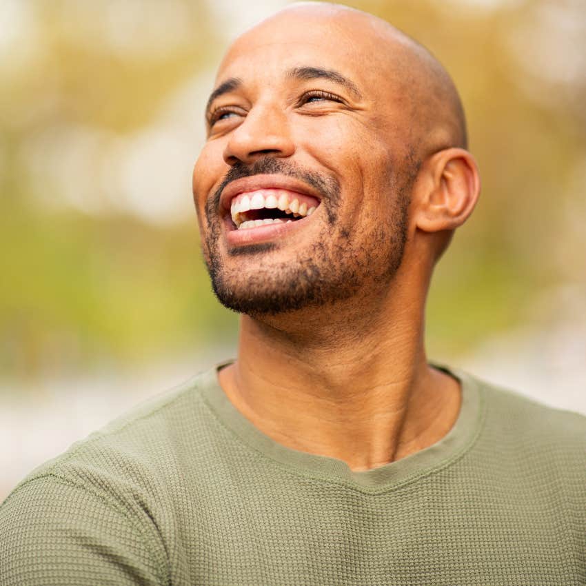 man who is a happy person as he works on happiness being his state of being