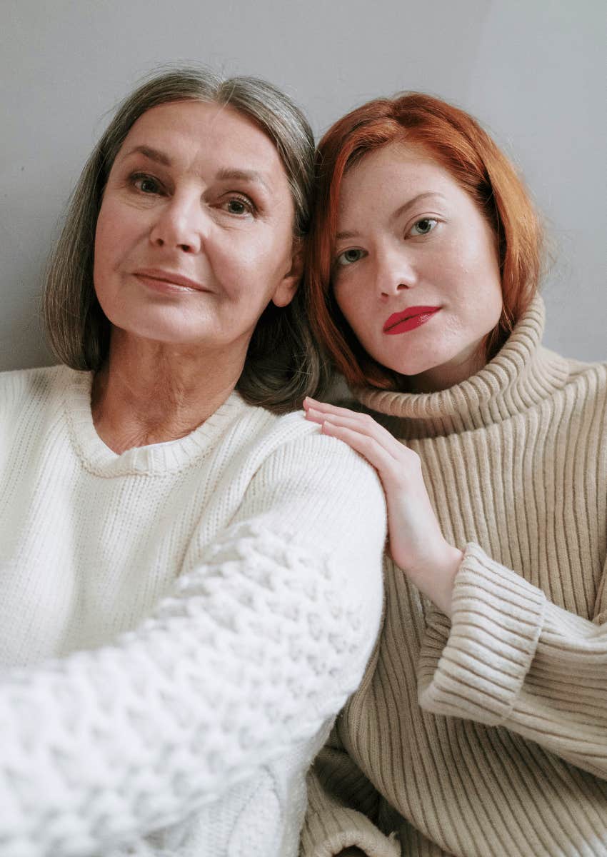 strong mom posing with her daughter