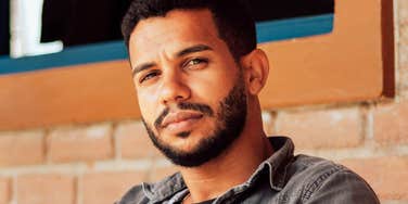 Serious person representing the key differences between a psychopath and a sociopath, illustrating traits, behaviors, and warning signs