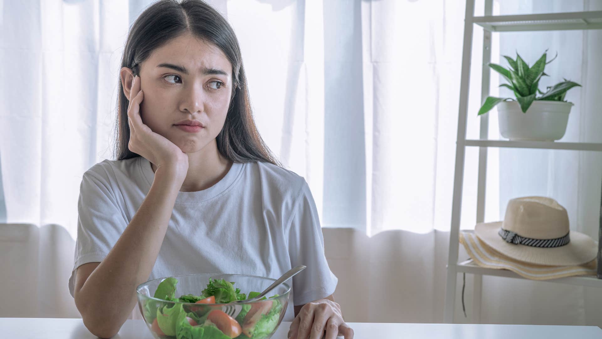 woman looking disgusted as she's an overly picky eater