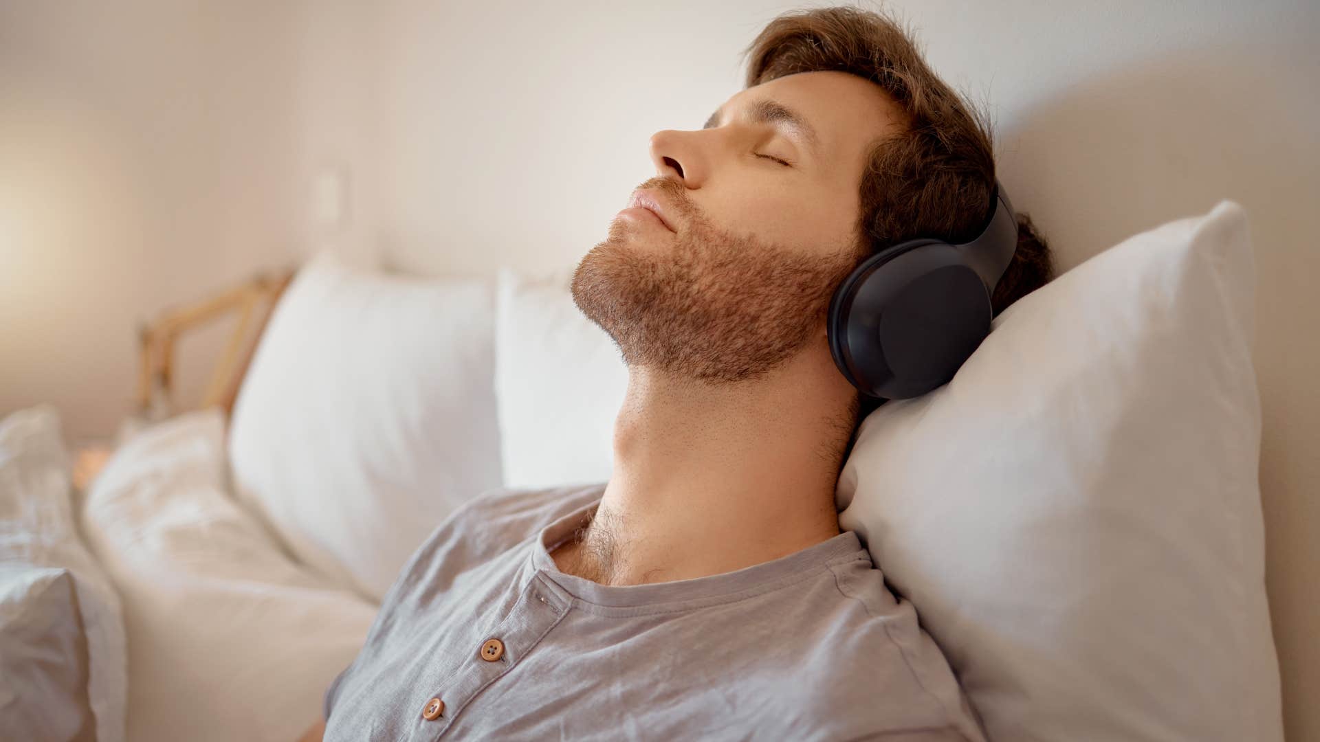 kind man recharging as he listens to music