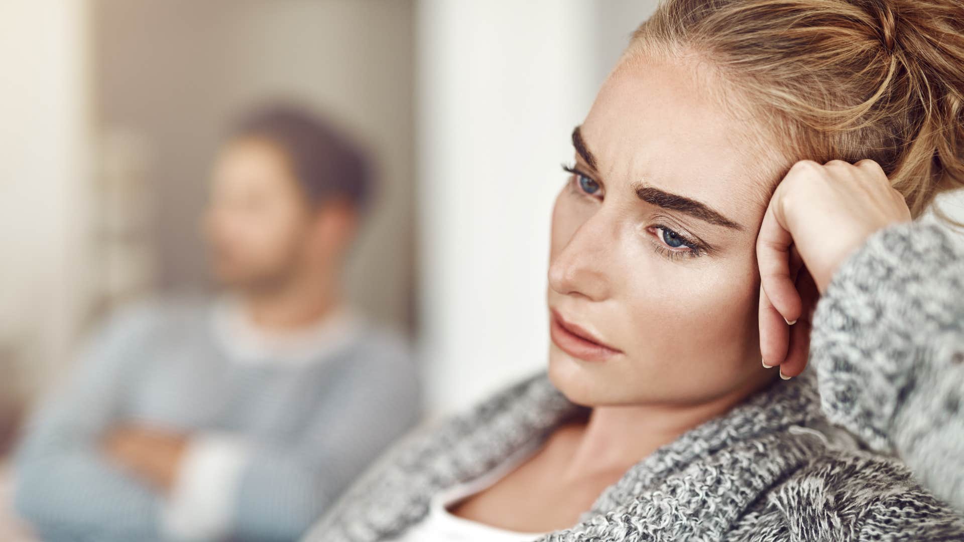kind woman thinking deeply realizing she can't control other people's choices