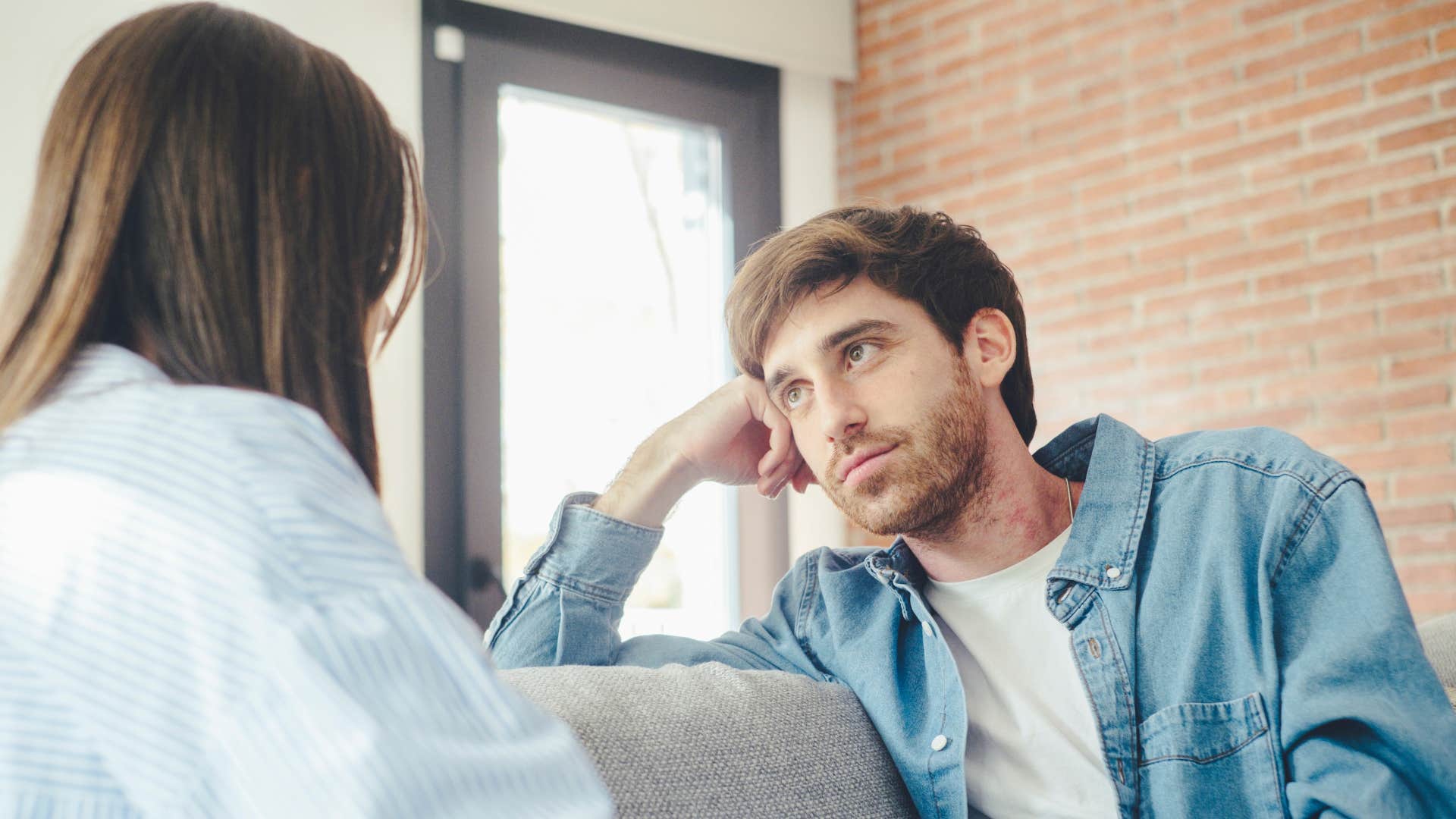 man listening to woman realizing he can't fix everyone