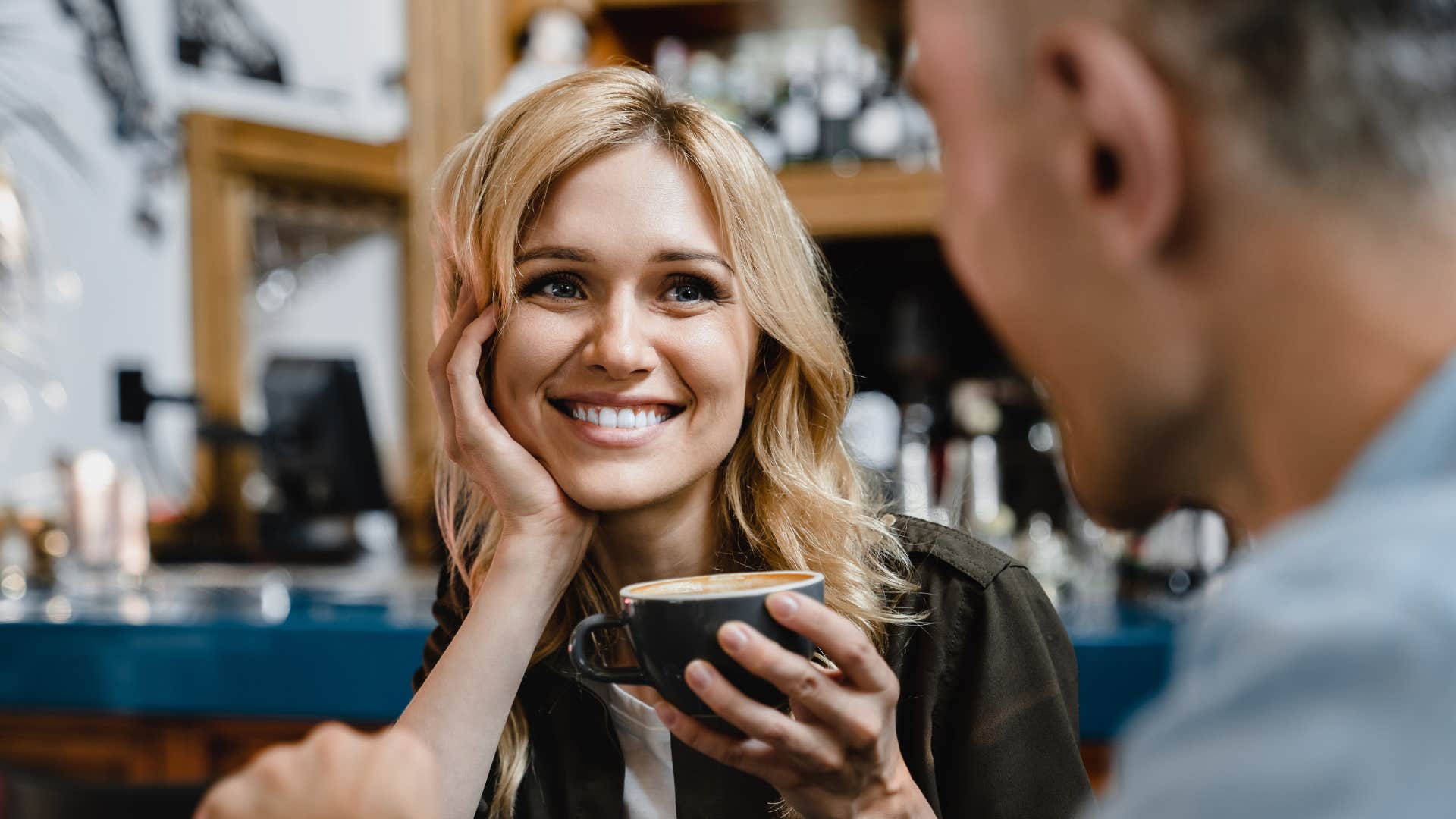 smiling woman craving male approval from man