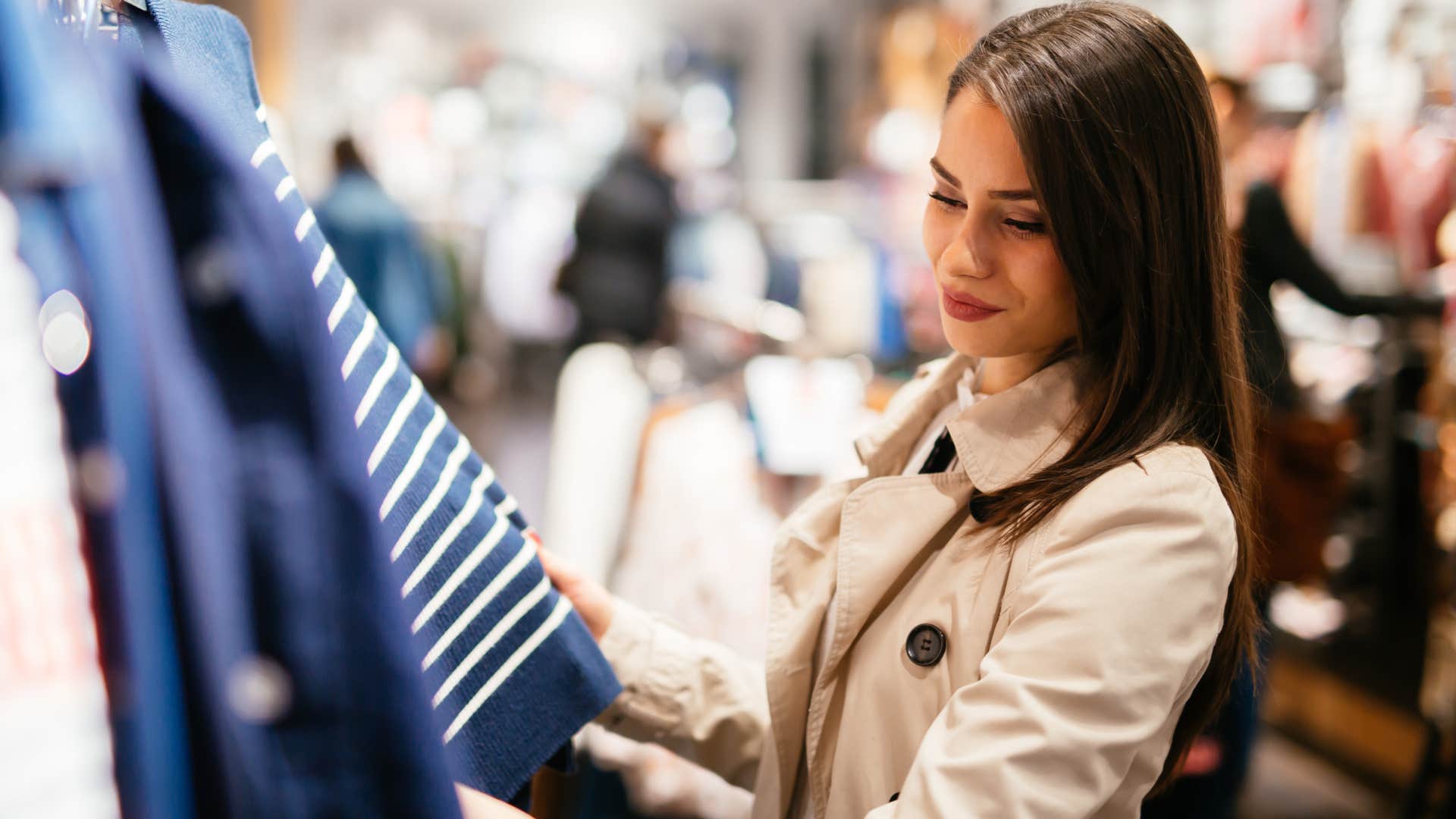 woman shopping for high-quality clothes in the store