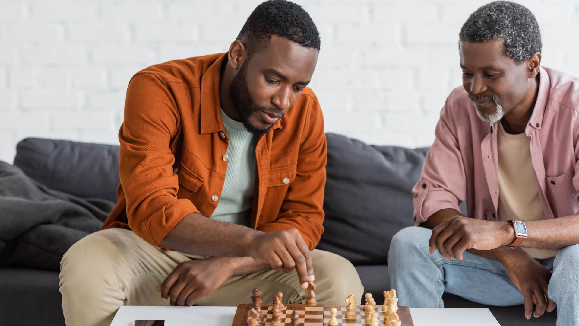 intelligent men playing complex time-consuming game of chess