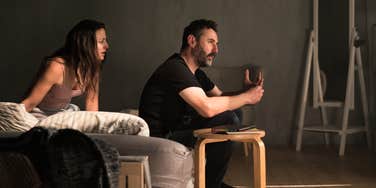 Couple arguing after discovering cheating in relationship.