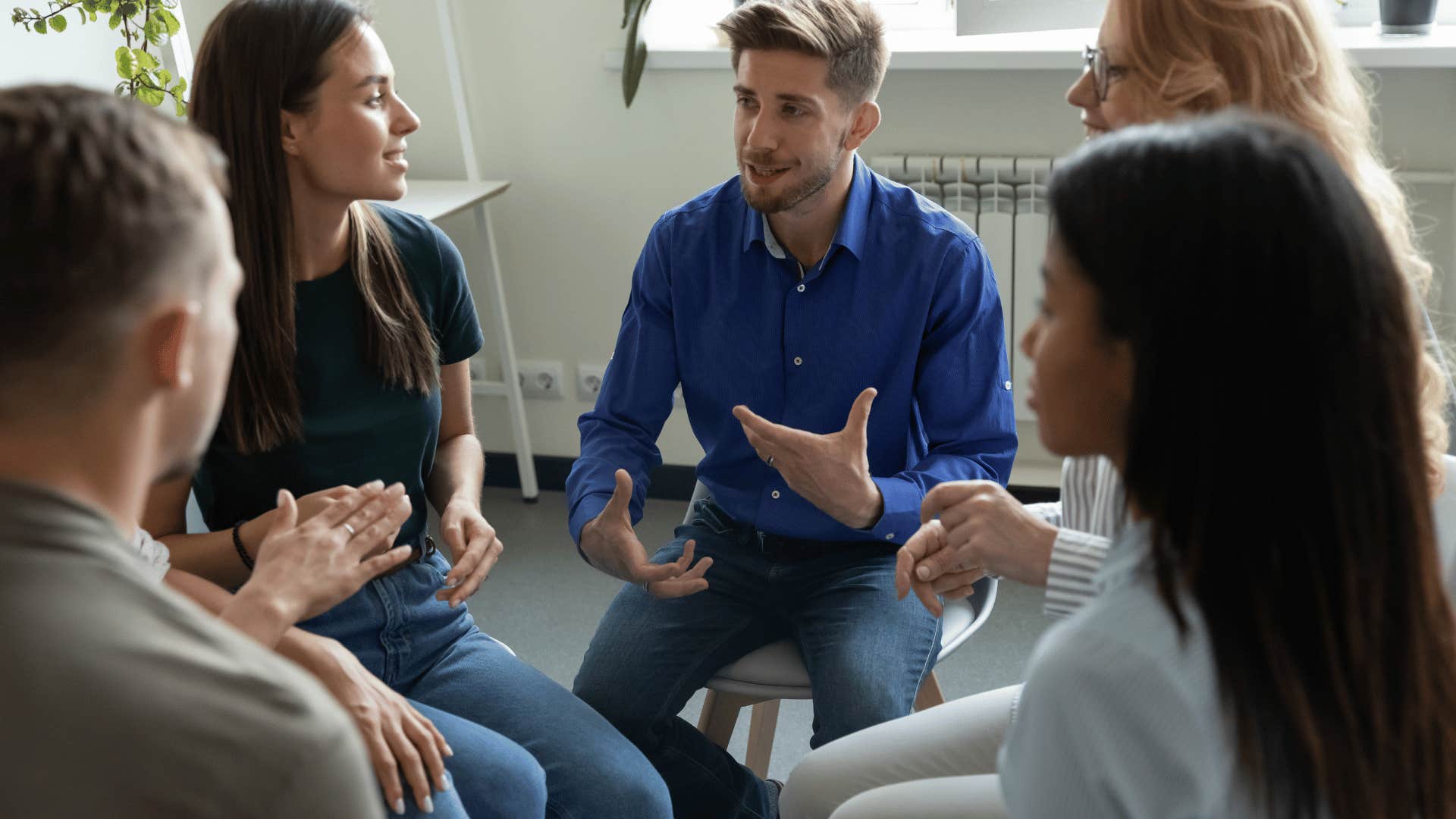 man showing his intelligence by actively listening