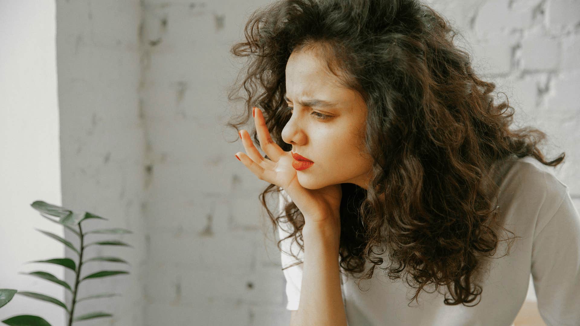 woman feeling confusion from a partner who needs to mature