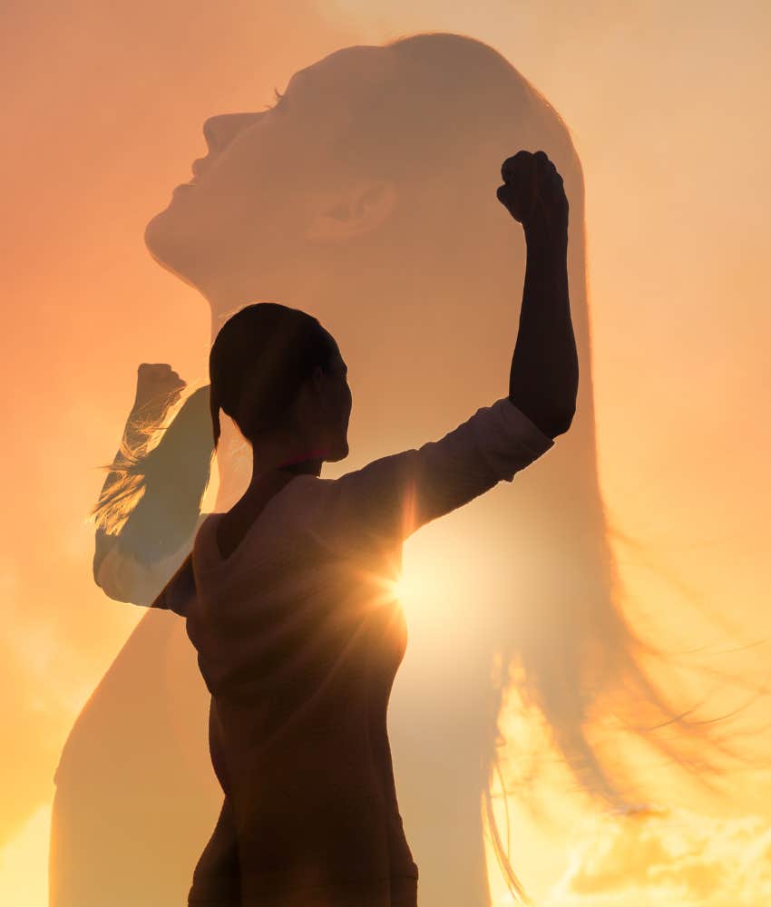 Strong woman flexes toward sun showing single mom as superhero