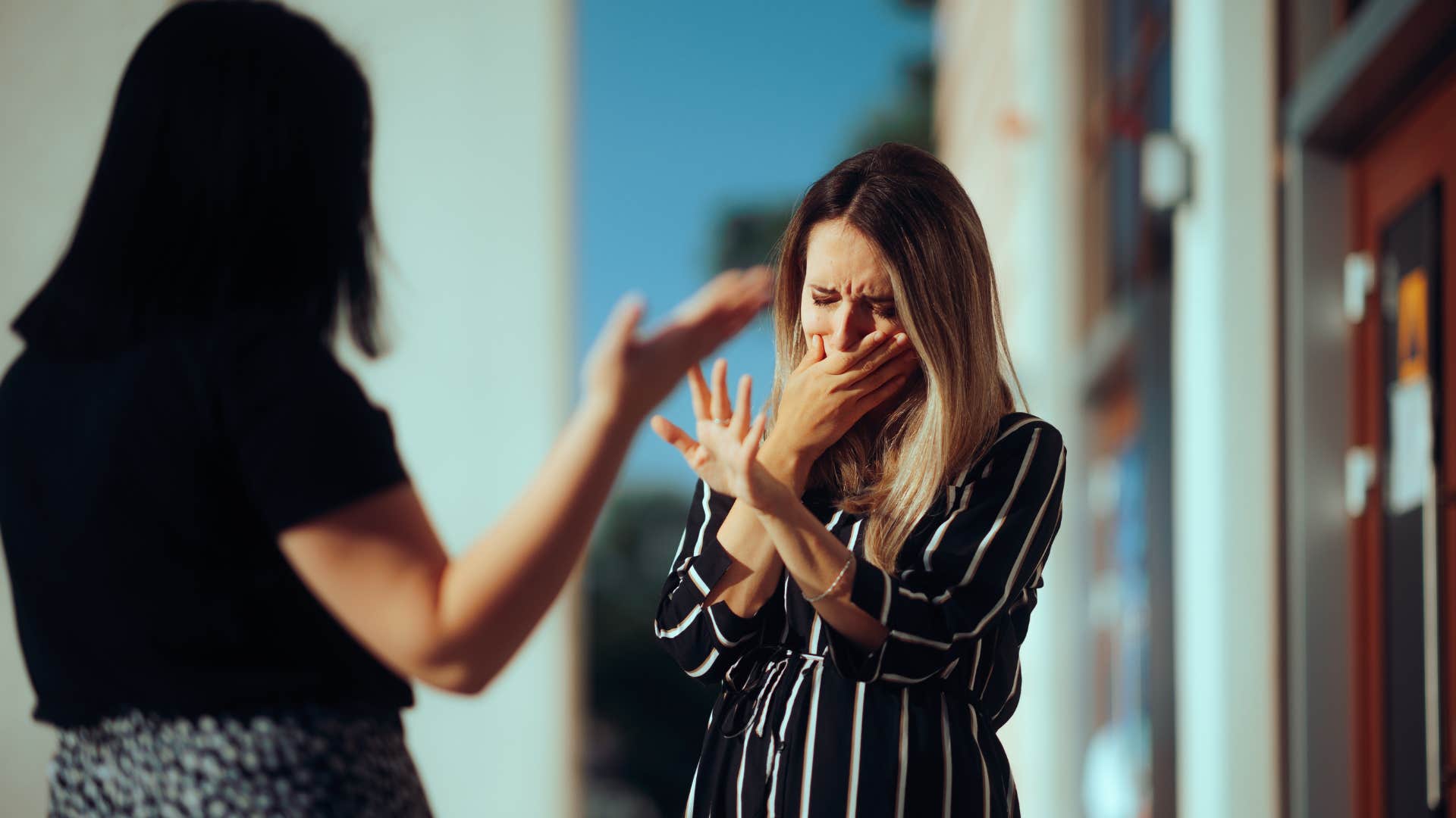 dramatic woman crying telling friend if she really cared about her